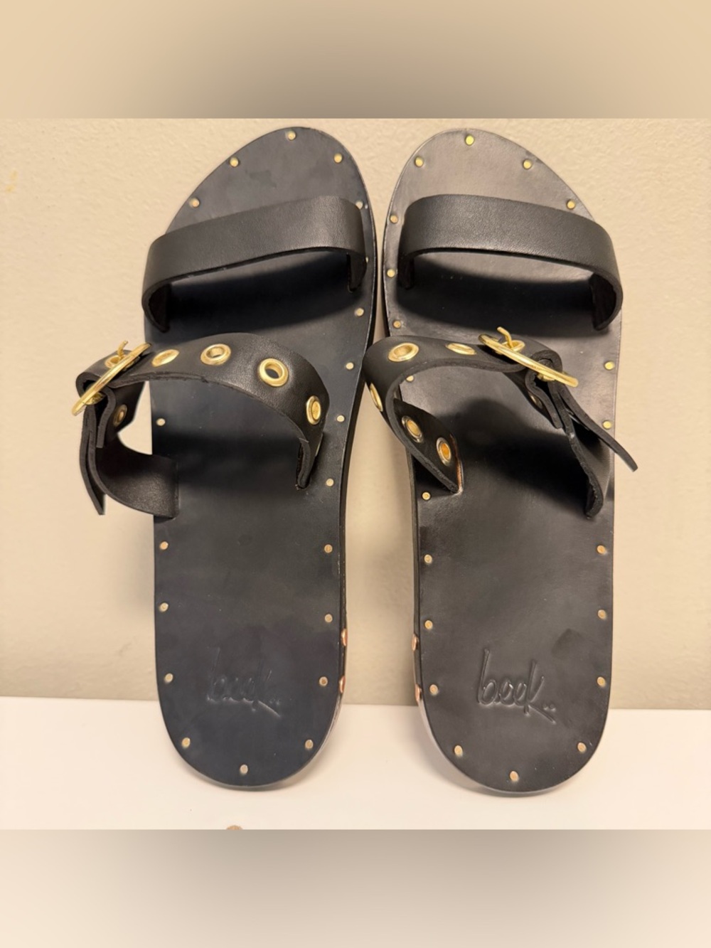 Beek MALEO LEATHER SLIP ON FLAT GOLD GROMETS BUCKLE Black Women’s US 8